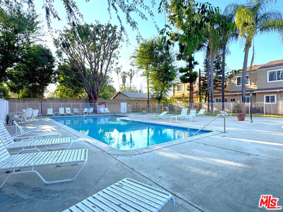 19928 Chase Street, Unit 27 Winnetka, CA 91306 - Photo 17 of 18 a view of fountain with a swimming pool