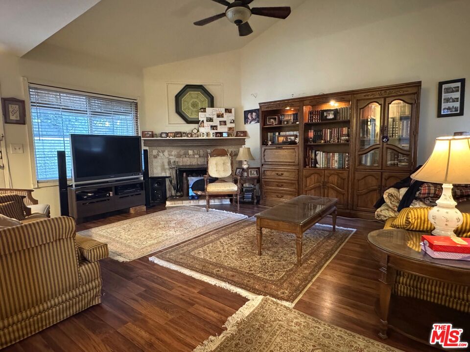 19928 Chase Street, Unit 27 Winnetka, CA 91306 - Photo 3 of 18 a living room with furniture and a flat screen tv