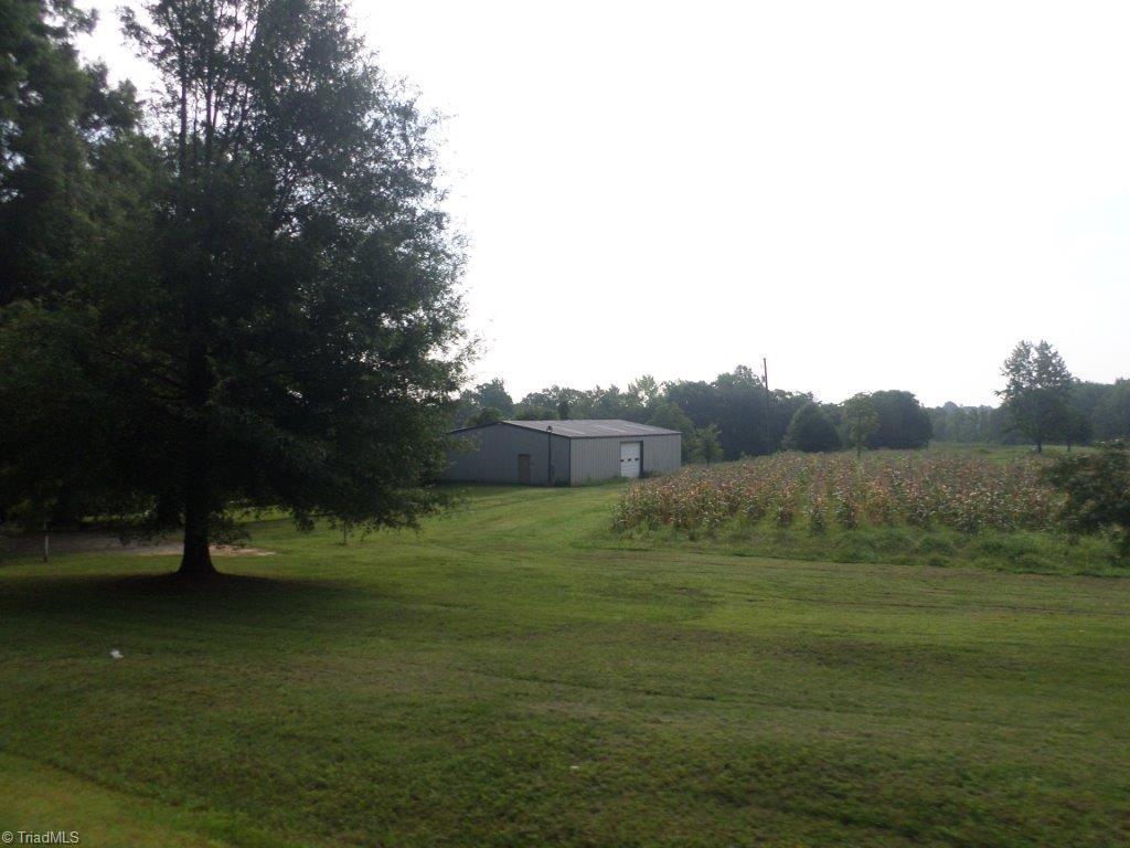 163 Manley Farm Road Reidsville, NC 27320 - Photo 20 of 30 view of the 40X60 shop from the side porch of the cottage