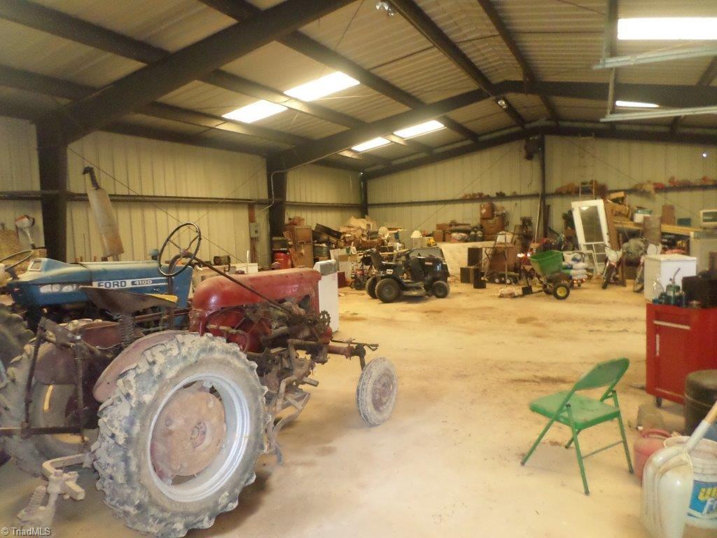 163 Manley Farm Road Reidsville, NC 27320 - Photo 22 of 30 interior of workshop per seller back corner is plumbed for a bathroom