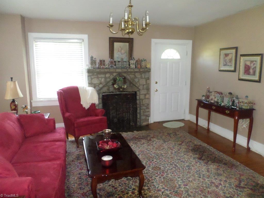 163 Manley Farm Road Reidsville, NC 27320 - Photo 30 of 30 view of LR from dining room rock fireplace with gas logs
