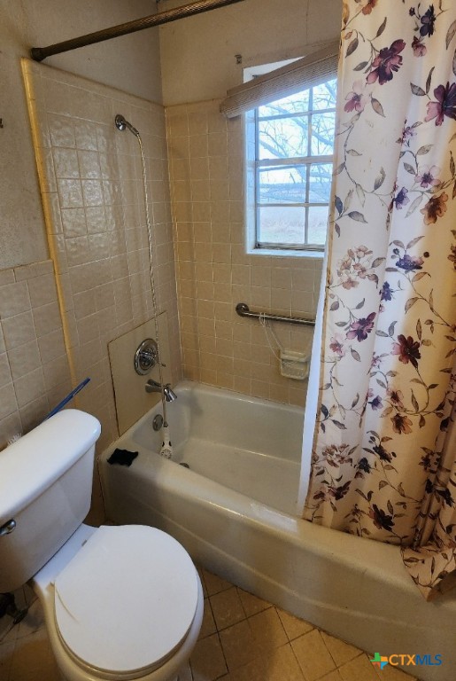 2002 Airville Road Temple, TX 76501 - Photo 19 of 41 a white toilet sitting next to a bath tub shower