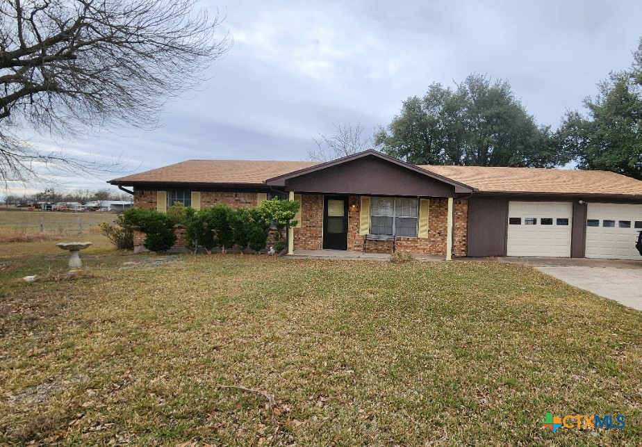 2002 Airville Road Temple, TX 76501 - Photo 2 of 41 a front view of a house with garden