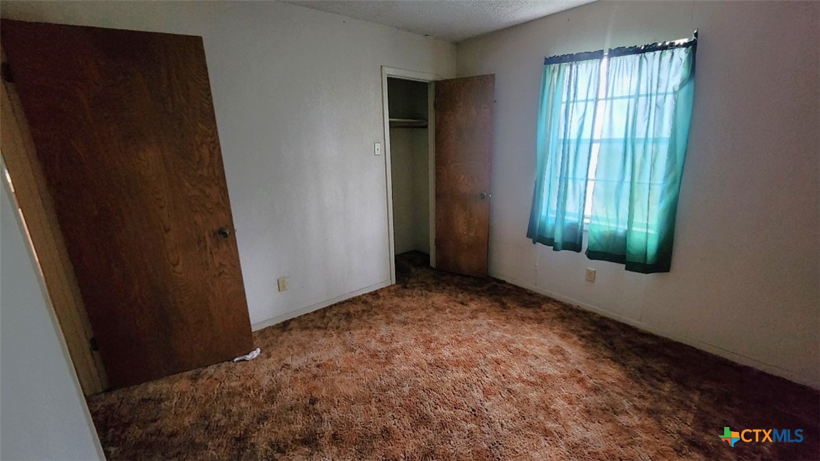 2002 Airville Road Temple, TX 76501 - Photo 23 of 41 an empty room with windows