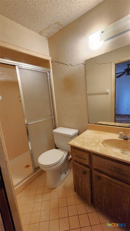 2002 Airville Road Temple, TX 76501 - Photo 24 of 41 a bathroom with a granite countertop sink toilet and shower