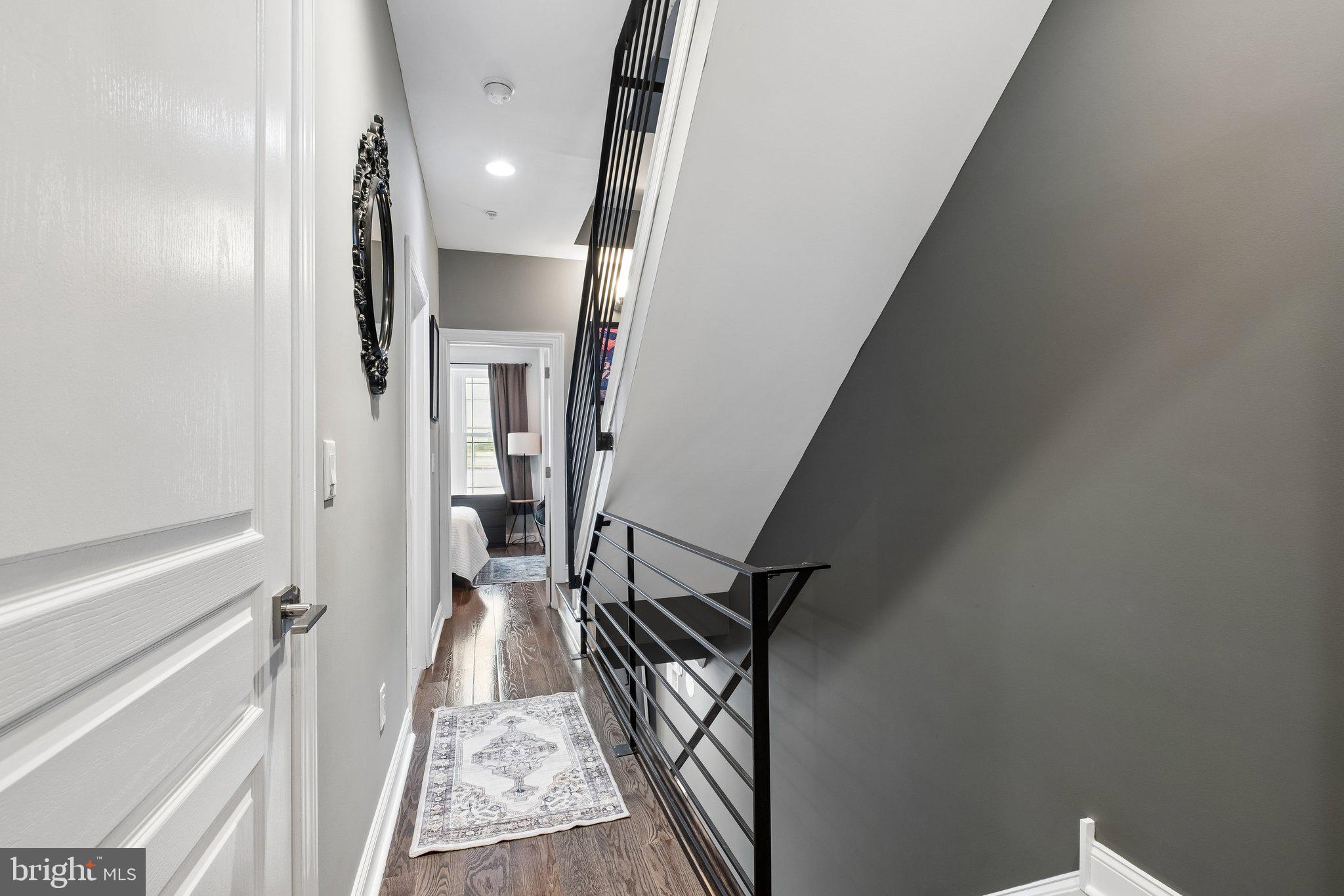 3356 Agate Street Philadelphia, PA 19134 - Photo 14 of 31 a view of a hallway with wooden floor and staircase