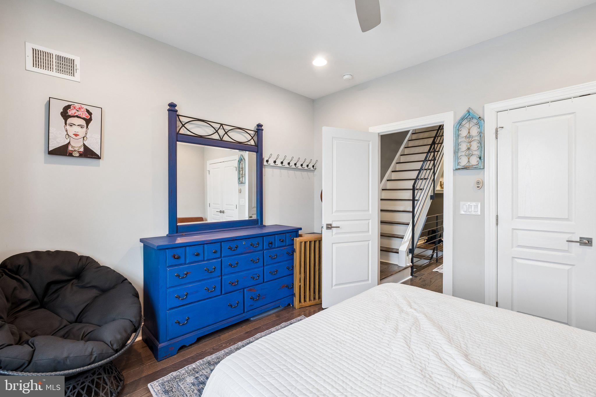 3356 Agate Street Philadelphia, PA 19134 - Photo 21 of 31 a bedroom with a bed and a dresser
