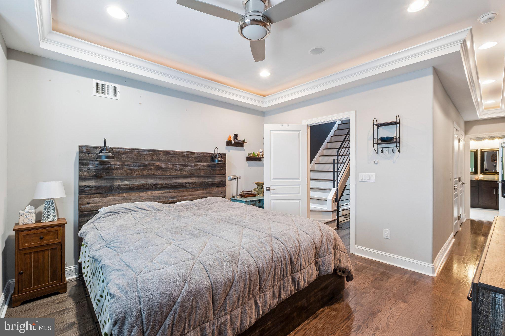3356 Agate Street Philadelphia, PA 19134 - Photo 25 of 31 a bedroom with a bed and a walk in closet