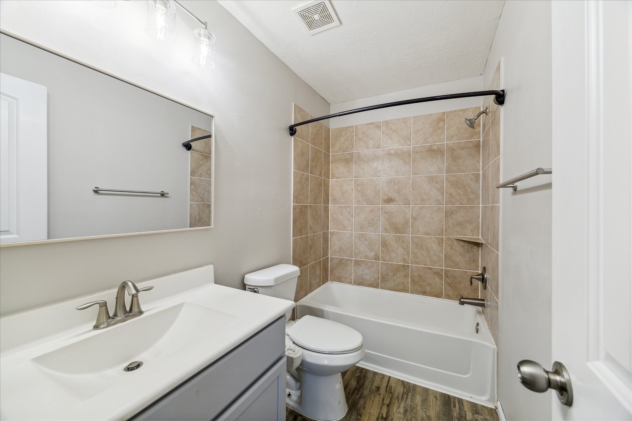 5710 Mid Way Kingwood, TX 77339 - Photo 8 of 15 a bathroom with a sink toilet and shower