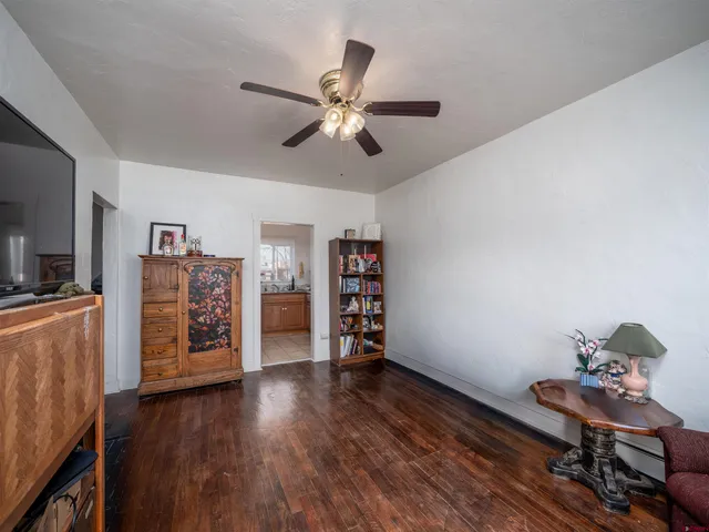 a room with furniture and wooden floor
