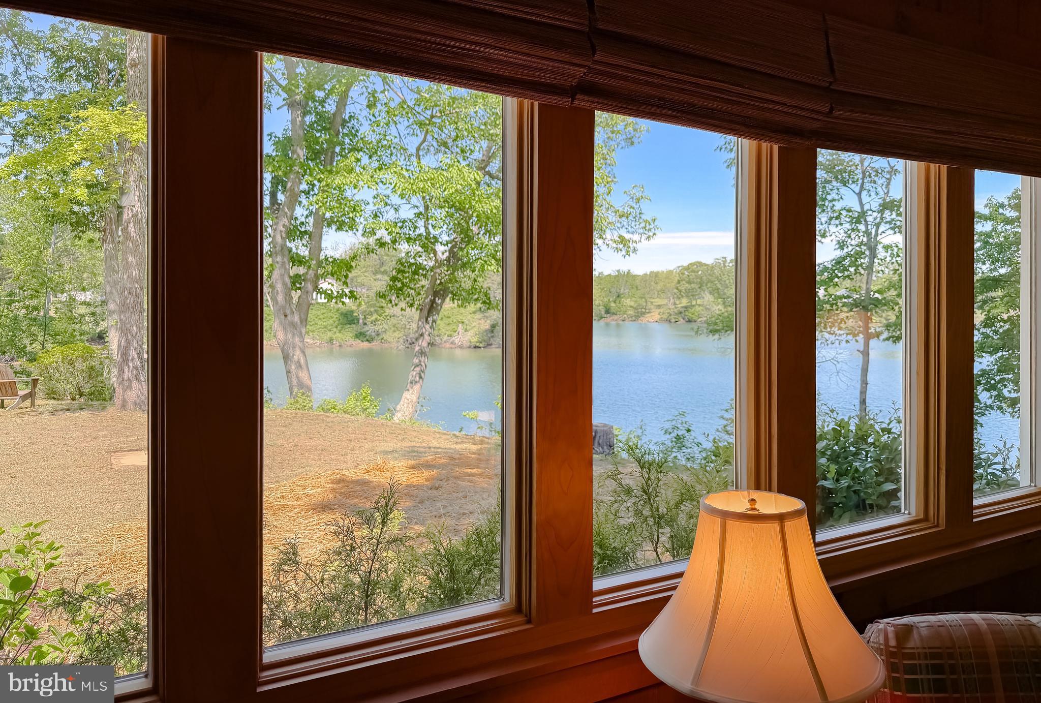 23761 Kingston Creek Road California, MD 20619 - Photo 32 of 61 a view of a large window with an outdoor view