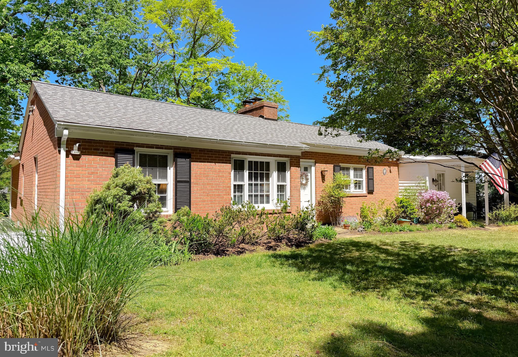 23761 Kingston Creek Road California, MD 20619 - Photo 57 of 61 a front view of a house with garden