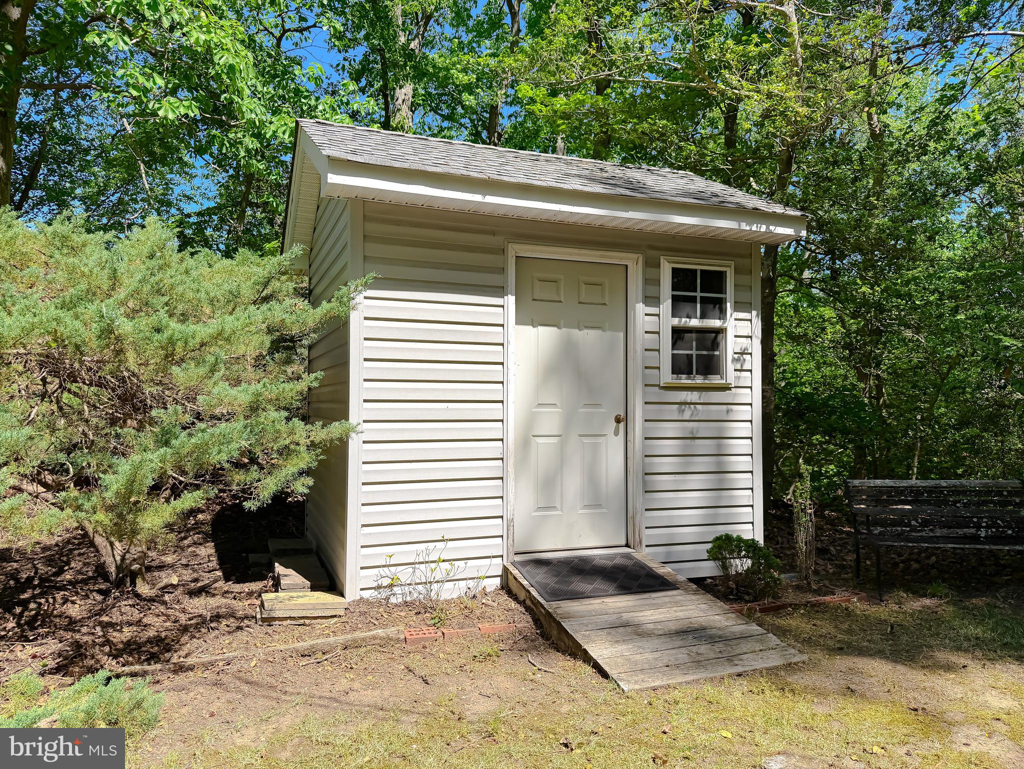 23761 Kingston Creek Road California, MD 20619 - Photo 61 of 61 a front view of a house with a yard