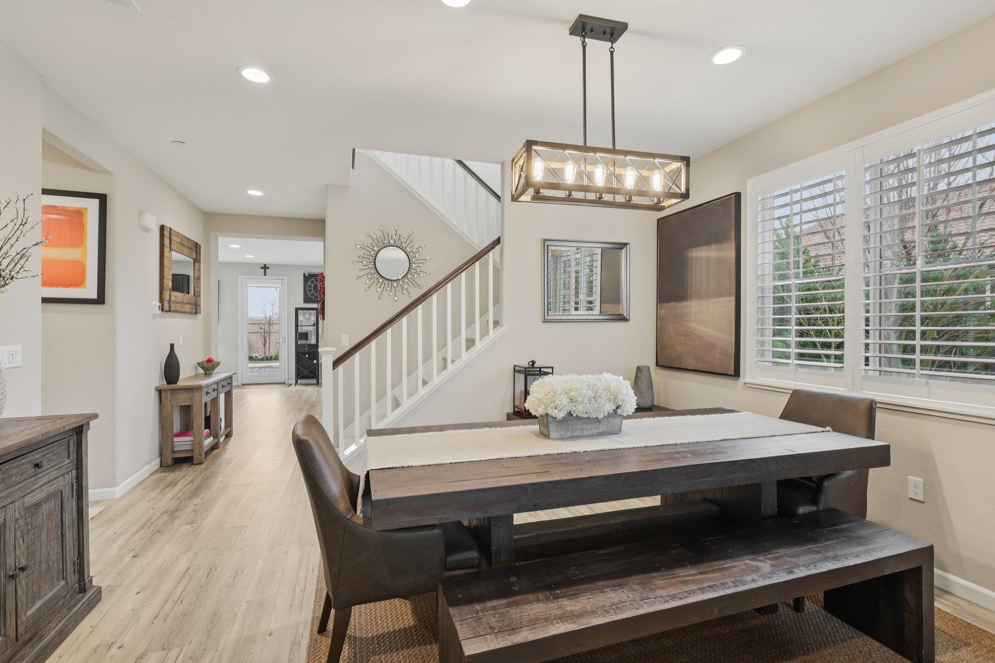 165 Little Ranch Circle Oakley, CA 94561 - Photo 11 of 60 Dining area featuring stairway, light wood-style floors, and recessed lighting