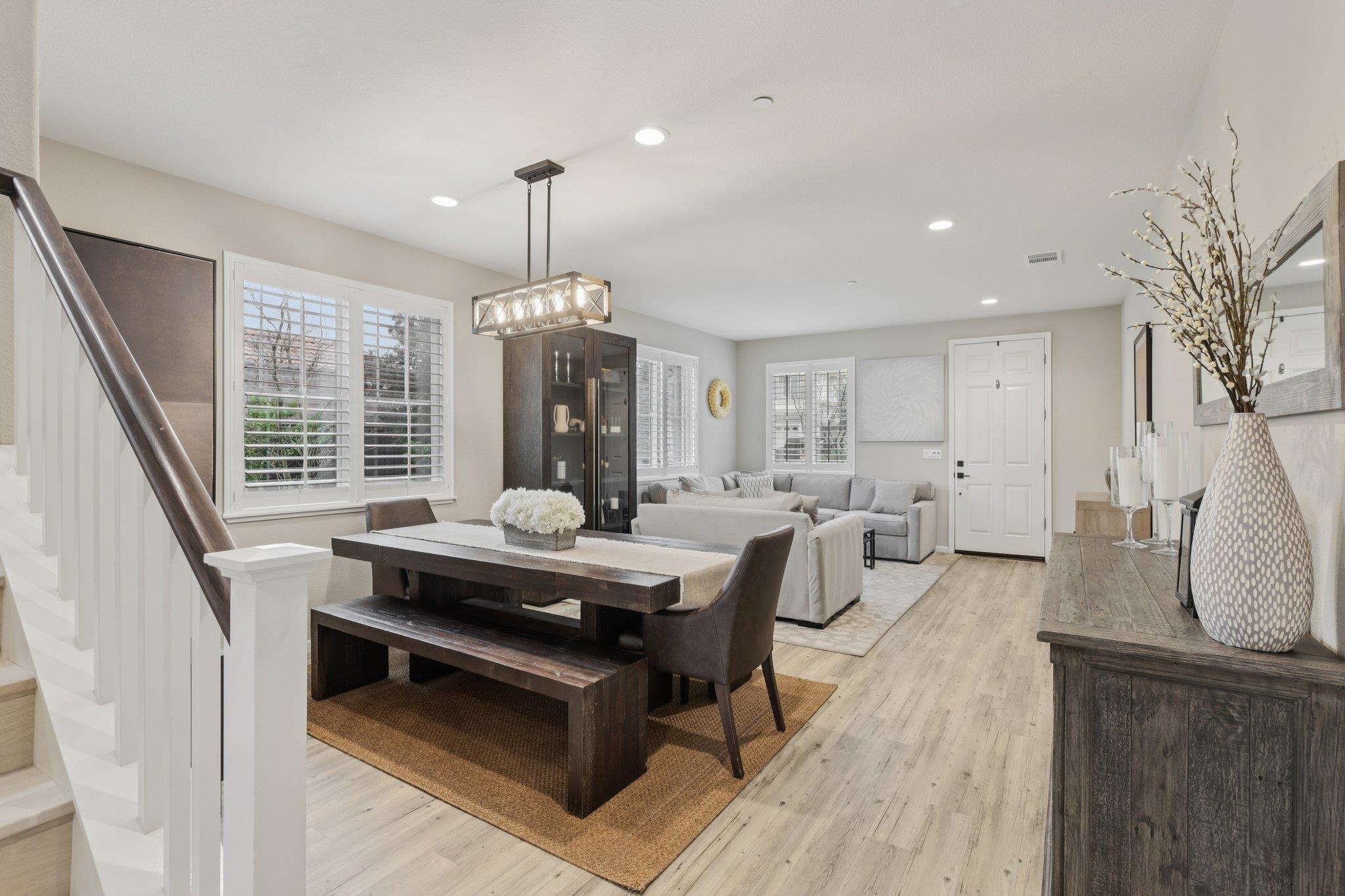 165 Little Ranch Circle Oakley, CA 94561 - Photo 12 of 60 Dining room with light wood finished floors, stairway, and recessed lighting