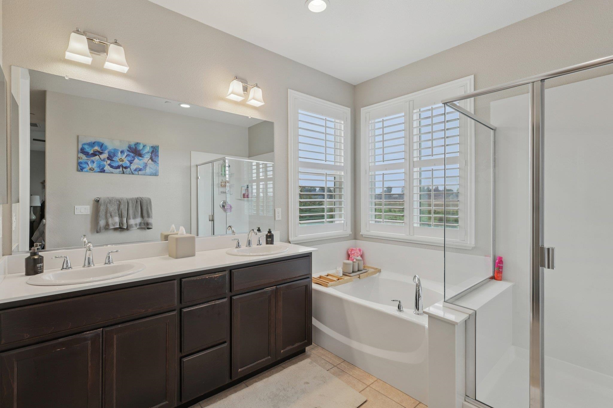 165 Little Ranch Circle Oakley, CA 94561 - Photo 31 of 60 Full bathroom featuring a garden tub, double vanity, a stall shower, and light tile patterned floors