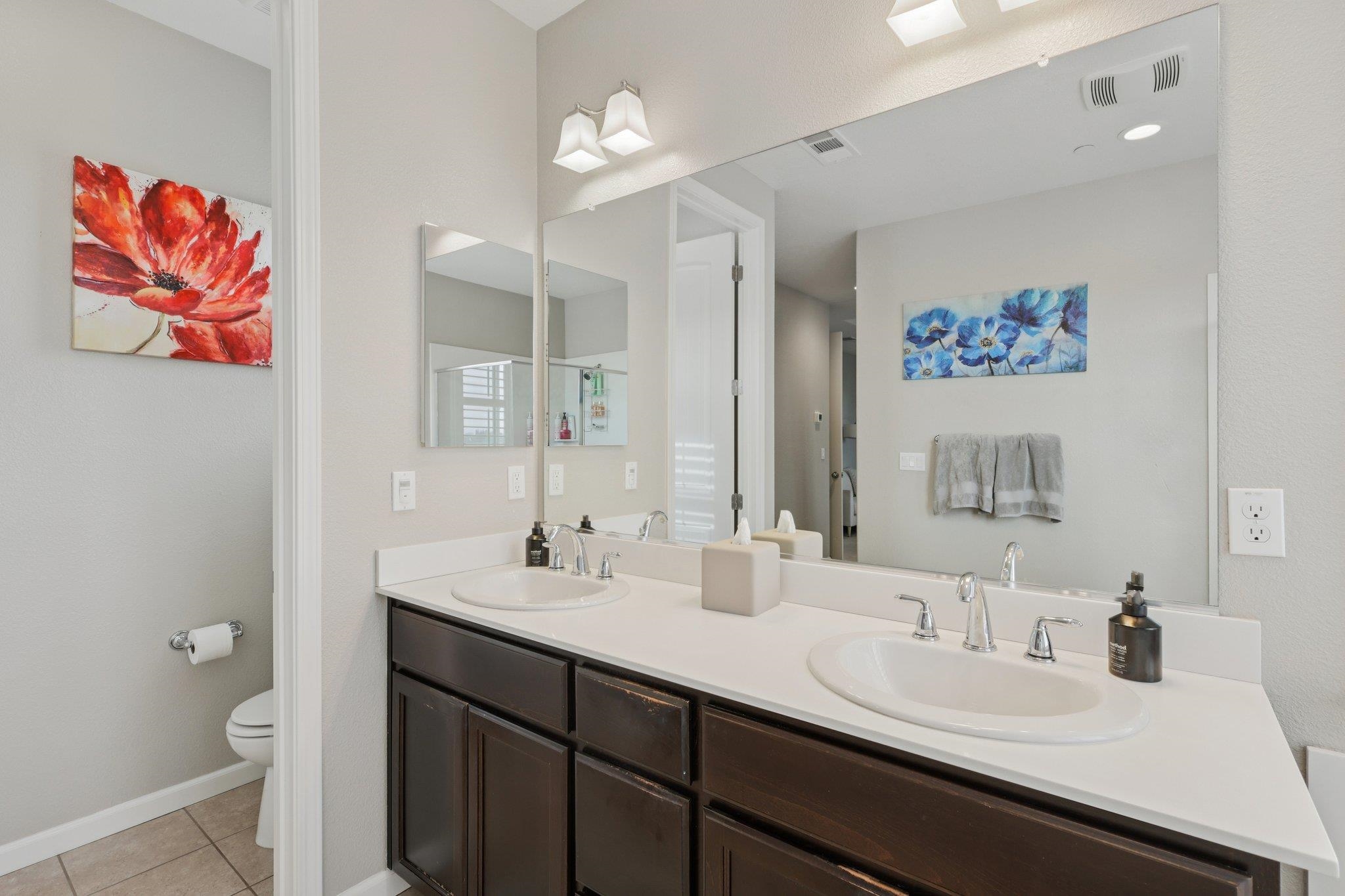 165 Little Ranch Circle Oakley, CA 94561 - Photo 32 of 60 Bathroom featuring double vanity and light tile patterned flooring