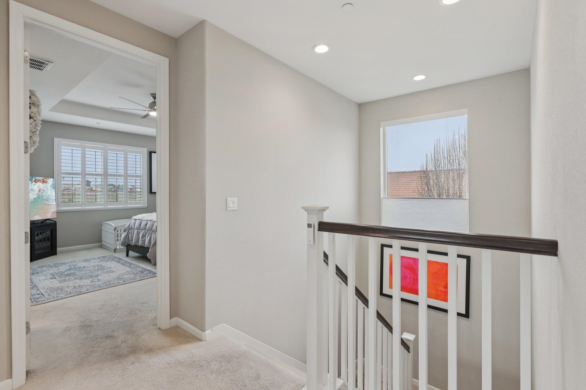 165 Little Ranch Circle Oakley, CA 94561 - Photo 37 of 60 Hallway featuring light colored carpet and an upstairs landing