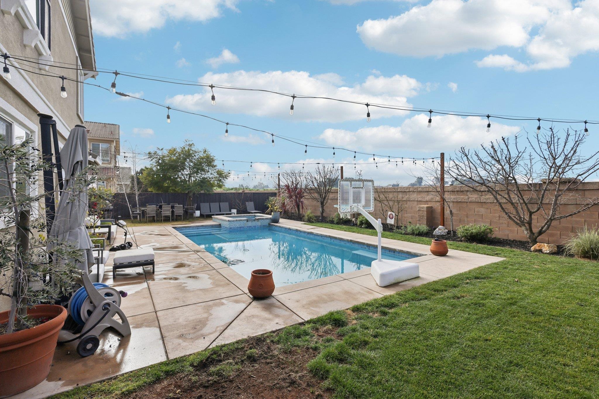 165 Little Ranch Circle Oakley, CA 94561 - Photo 42 of 60 View of pool featuring a fenced backyard, a patio, and a pool with connected hot tub