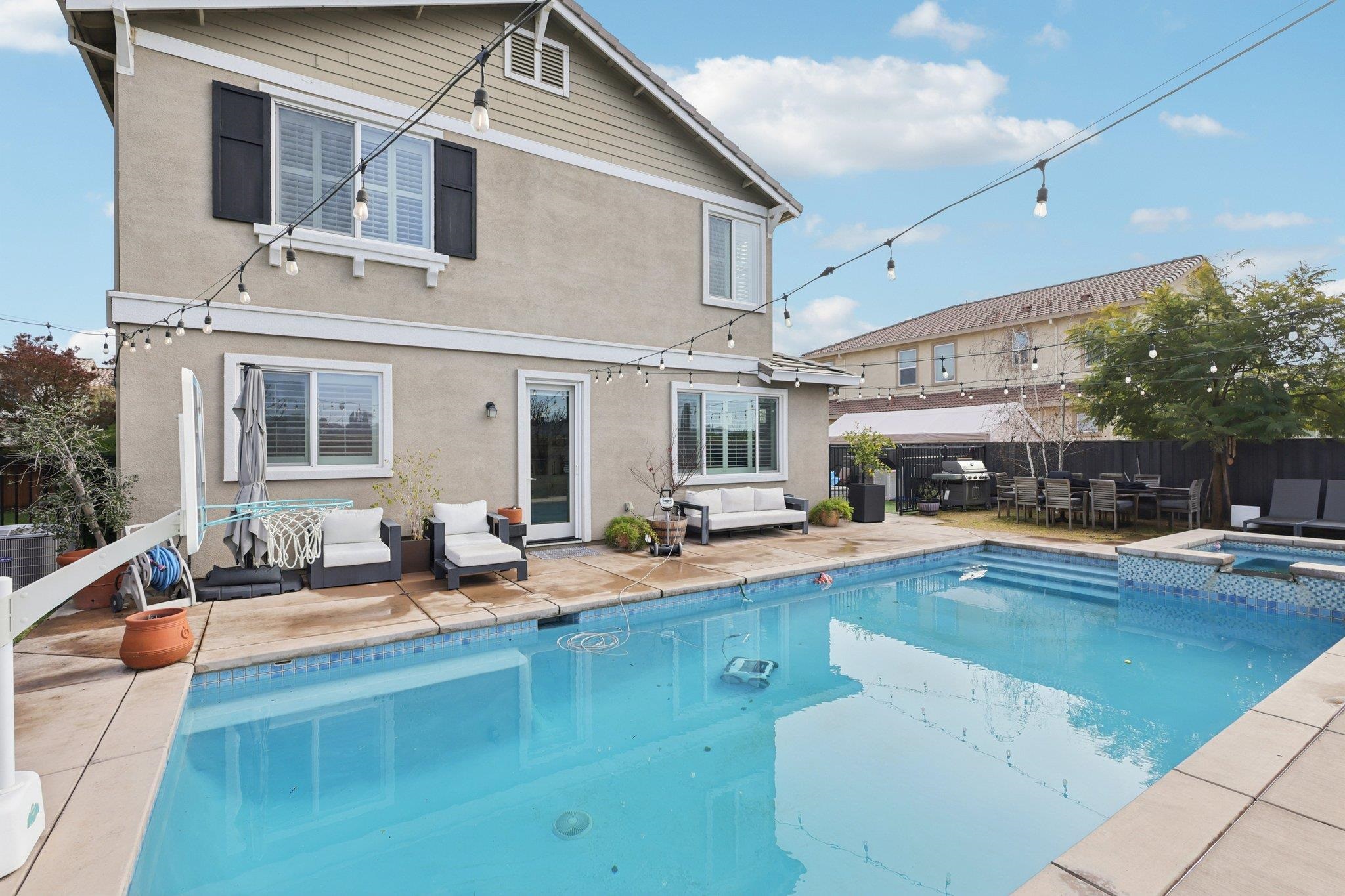 165 Little Ranch Circle Oakley, CA 94561 - Photo 43 of 60 Rear view of property featuring a fenced backyard, a patio area, stucco siding, and an outdoor living space