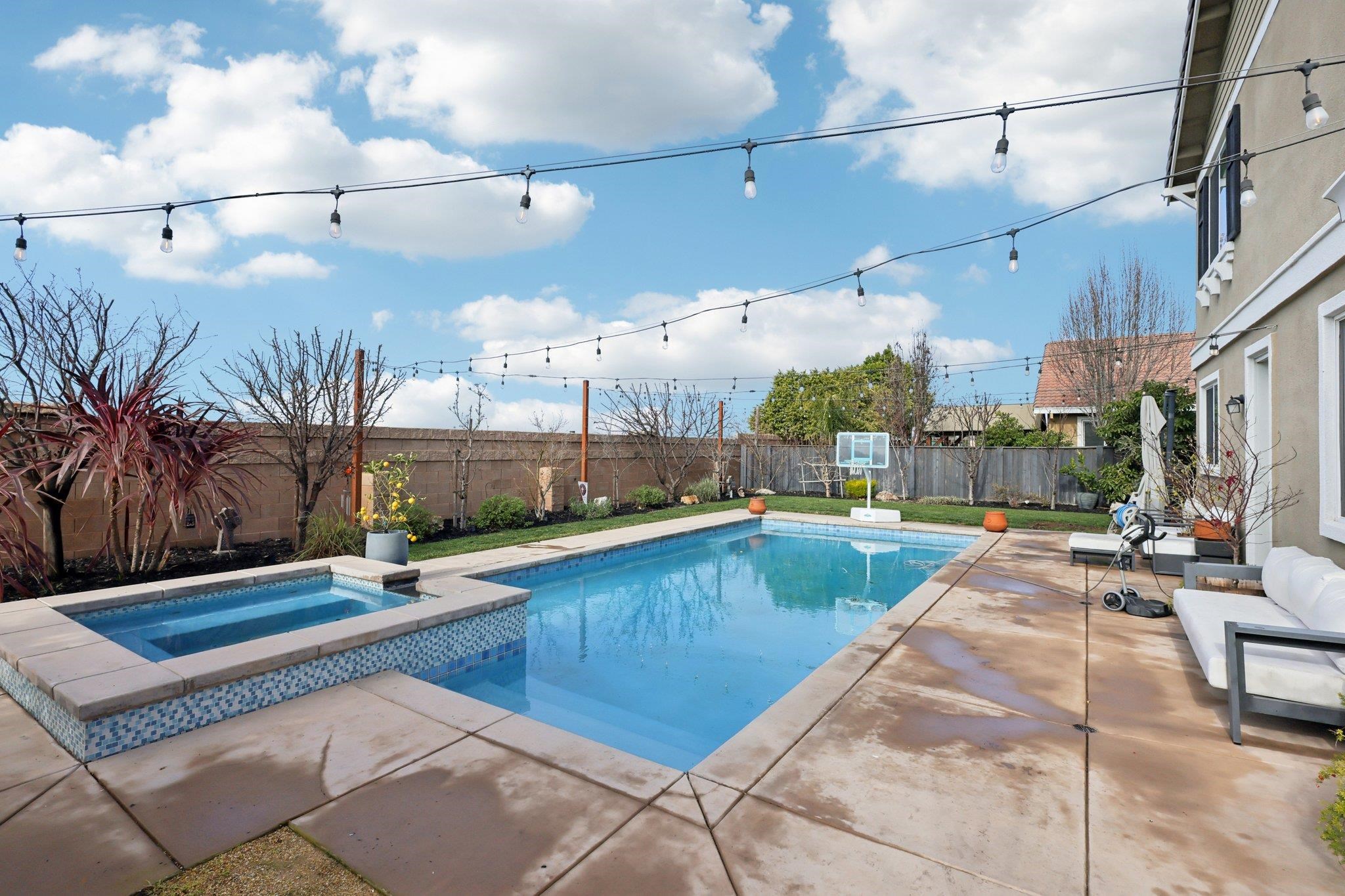 165 Little Ranch Circle Oakley, CA 94561 - Photo 48 of 60 View of swimming pool featuring a fenced backyard, a patio area, and a pool with connected hot tub