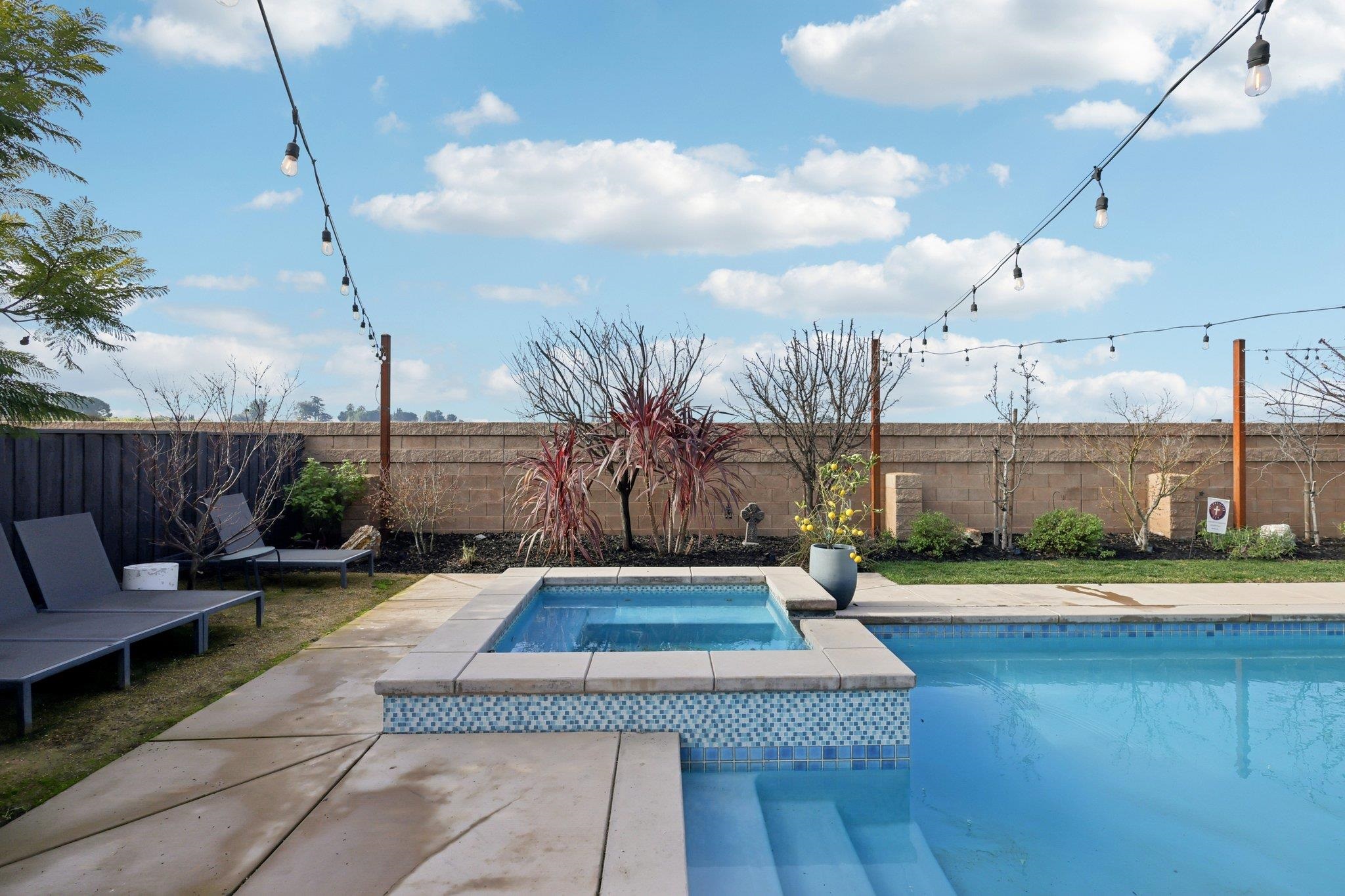 165 Little Ranch Circle Oakley, CA 94561 - Photo 49 of 60 View of swimming pool featuring a patio area, a fenced backyard, and a pool with connected hot tub