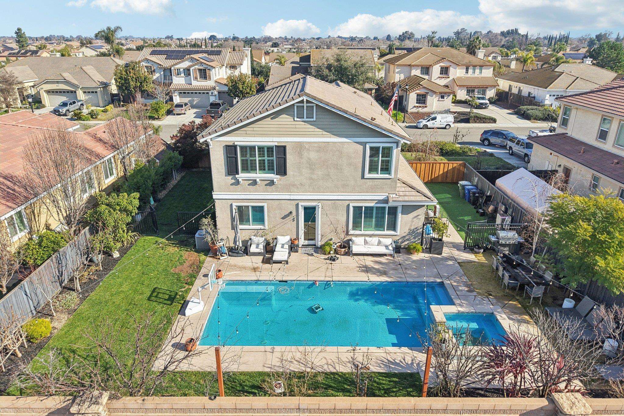 165 Little Ranch Circle Oakley, CA 94561 - Photo 53 of 60 Rear view of house with a fenced backyard, a residential view, a patio area, and stucco siding