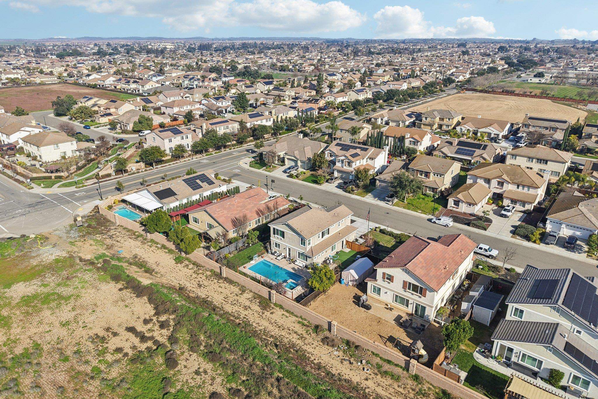 165 Little Ranch Circle Oakley, CA 94561 - Photo 56 of 60 Aerial view of property and surrounding area with nearby suburban area and a pool area