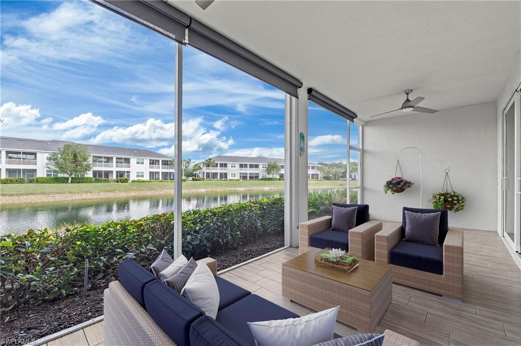 6954 Avalon Circle, Unit 703 Naples, FL 34112 - Photo 8 of 17 a outdoor living space with furniture and garden view