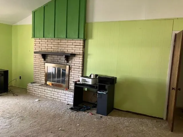 a living room with a fireplace