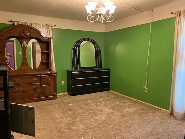 a bathroom with a sink a mirror and a shower