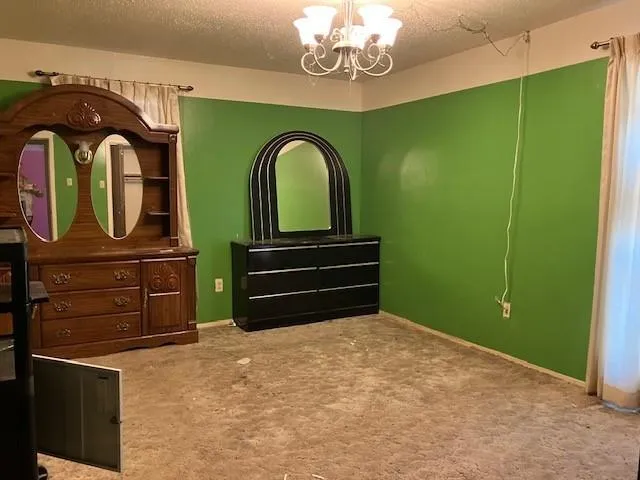 a bathroom with a sink a mirror and a shower