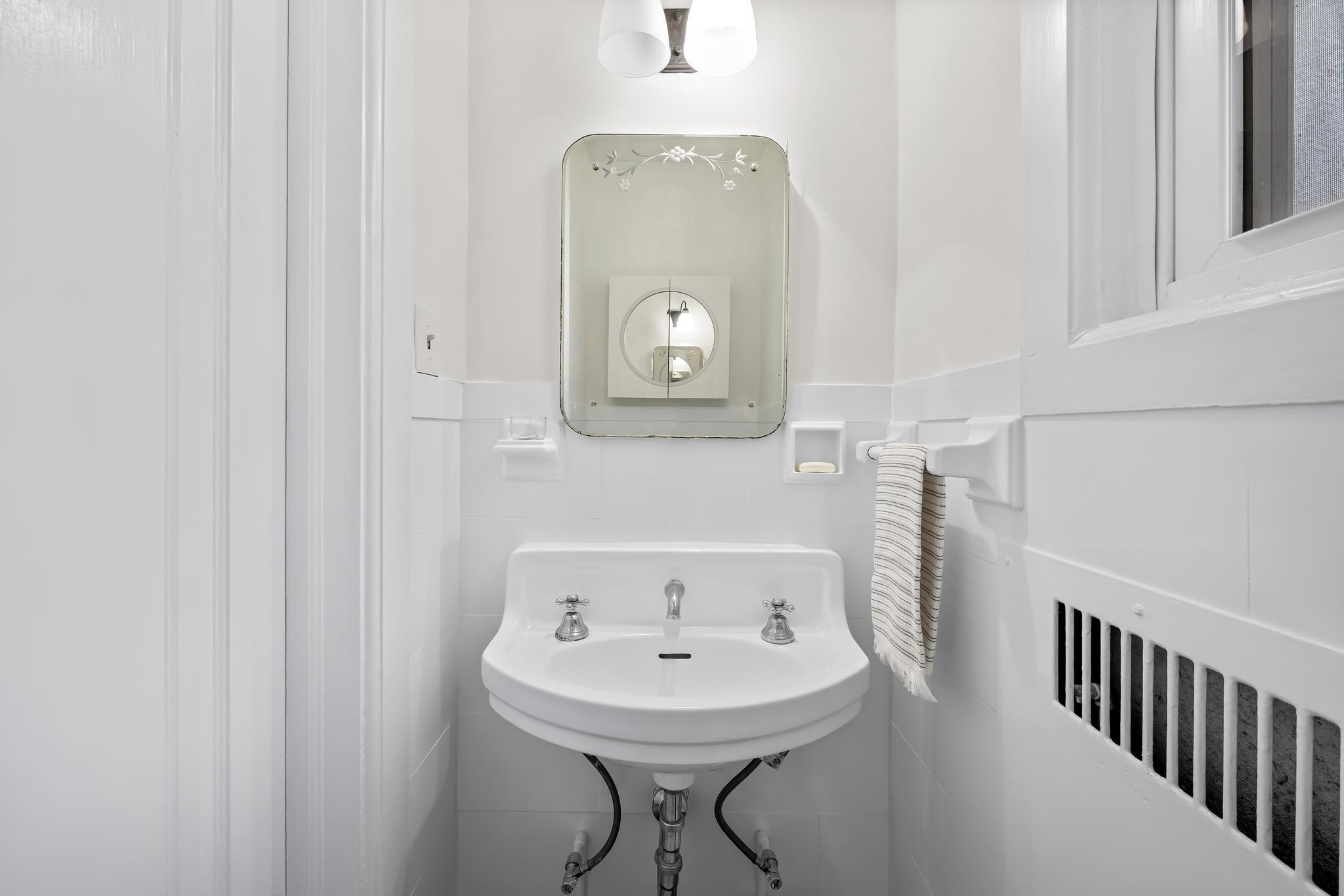2403 Ken Oak Road Baltimore, MD 21209 - Photo 18 of 59 First floor powder room