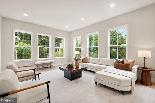 a view of a dining room with furniture and window