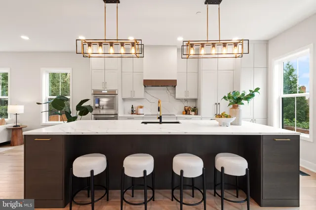 a bathroom with a sink vanity and a mirror