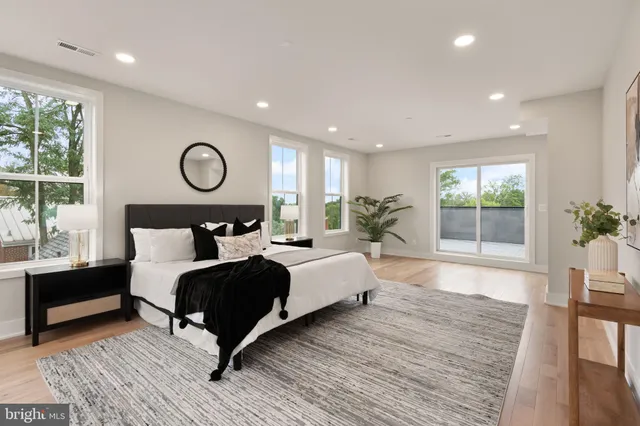 a kitchen with stainless steel appliances granite countertop a refrigerator microwave and stove