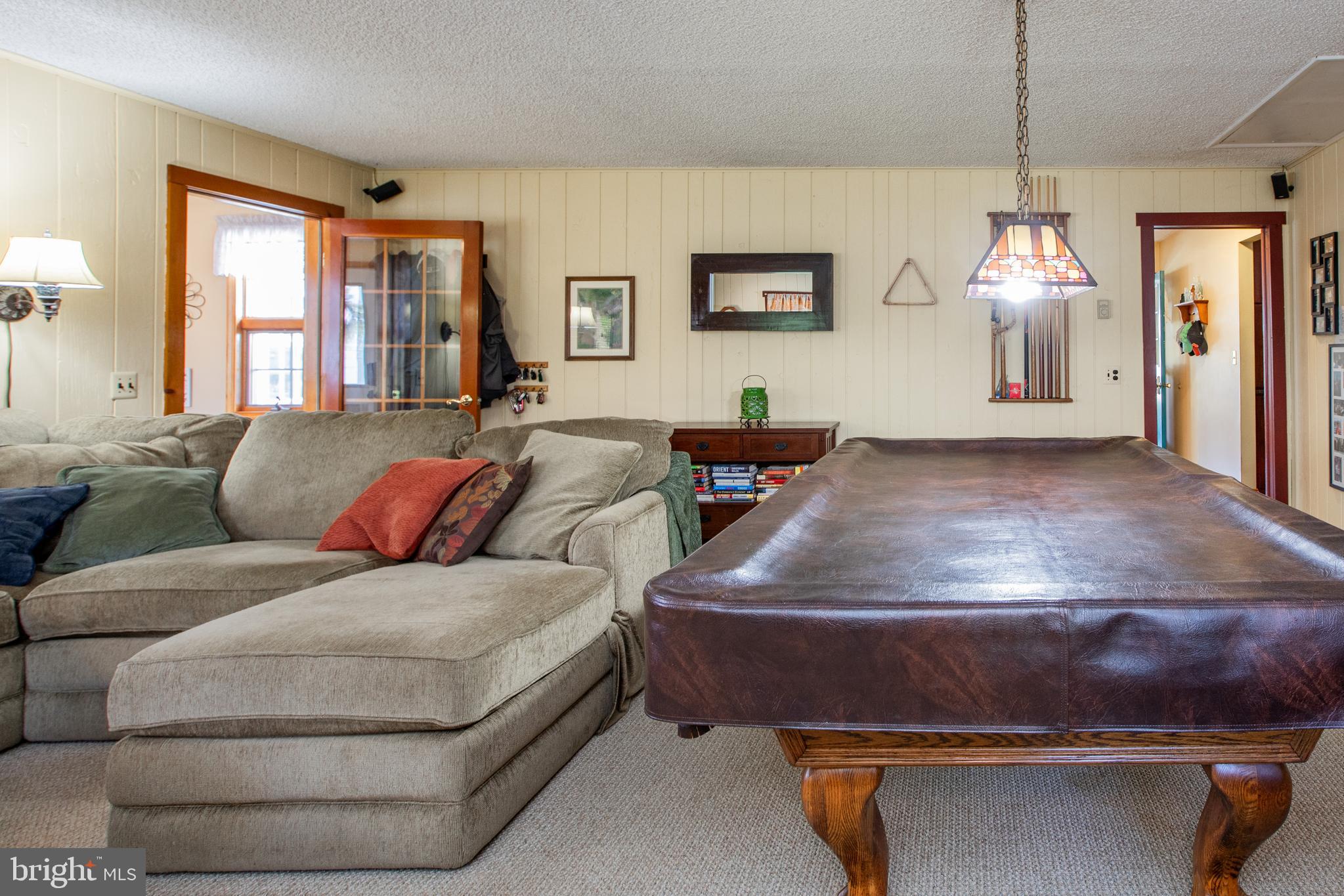 12 Millstream Road Cream Ridge, NJ 08514 - Photo 12 of 76 a living room with furniture and a window
