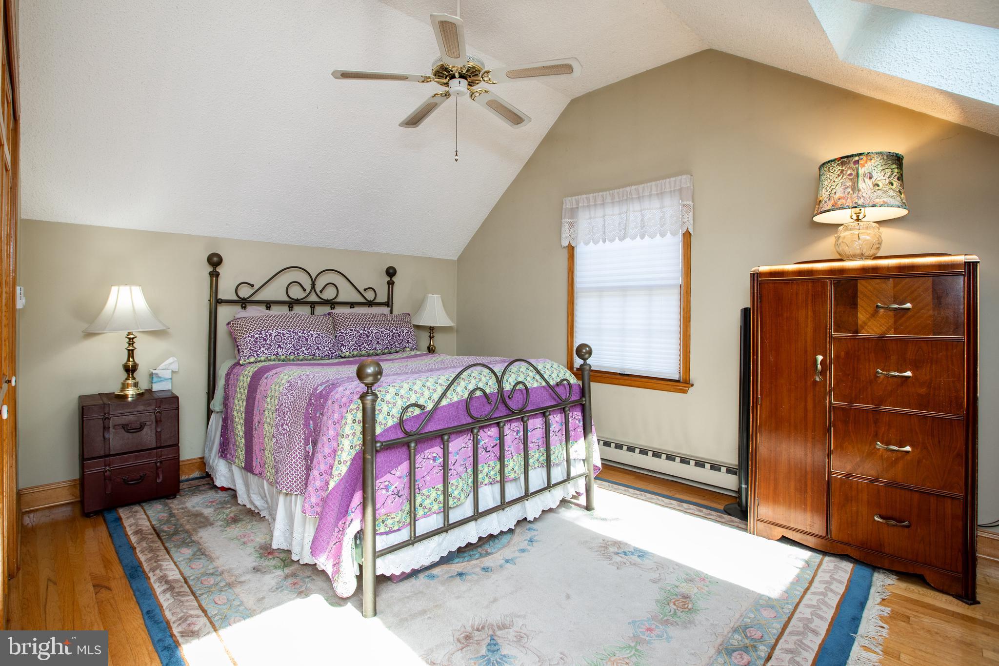12 Millstream Road Cream Ridge, NJ 08514 - Photo 39 of 76 a bedroom with a bed and a dresser