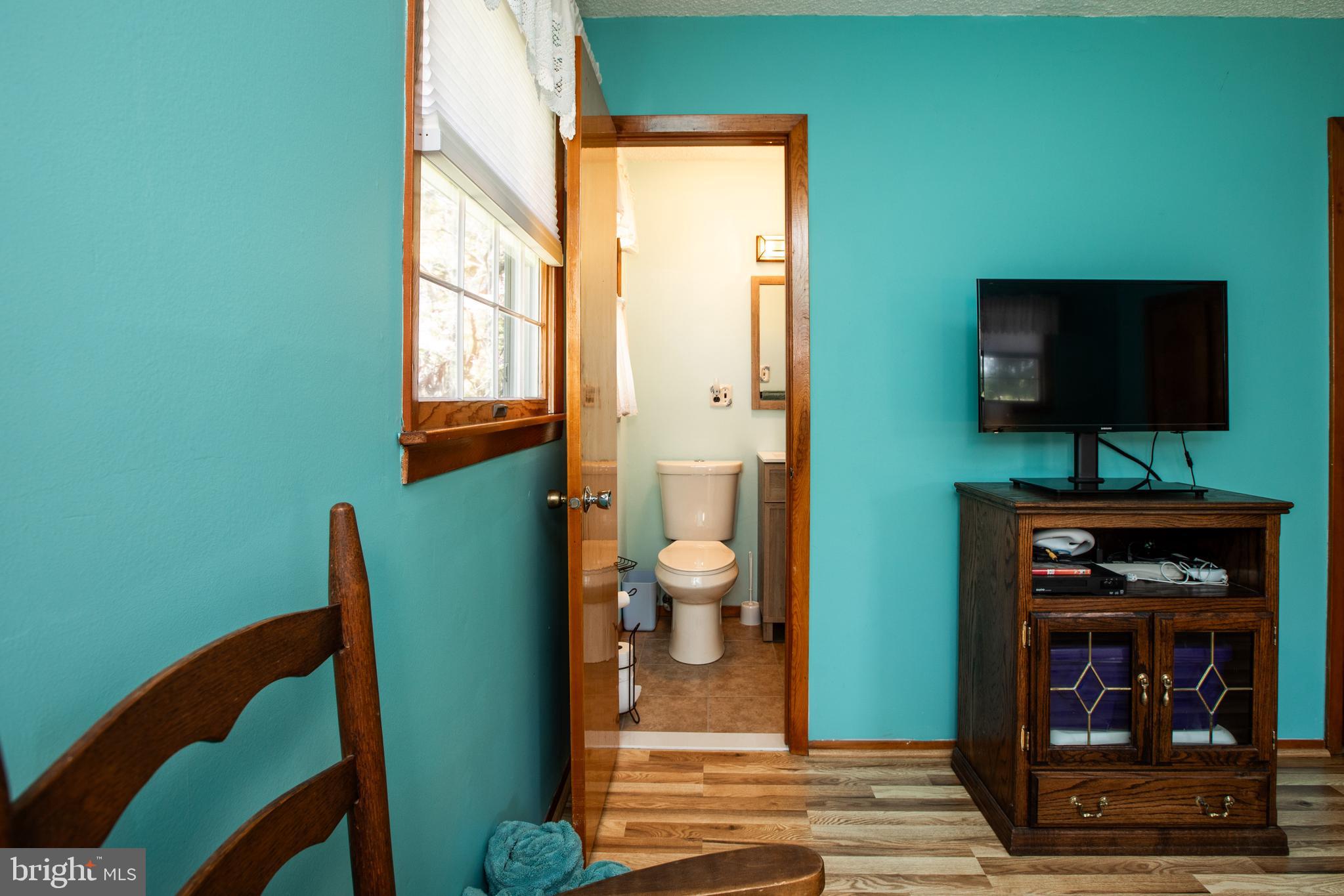 12 Millstream Road Cream Ridge, NJ 08514 - Photo 50 of 76 a view of a livingroom with furniture and an empty room