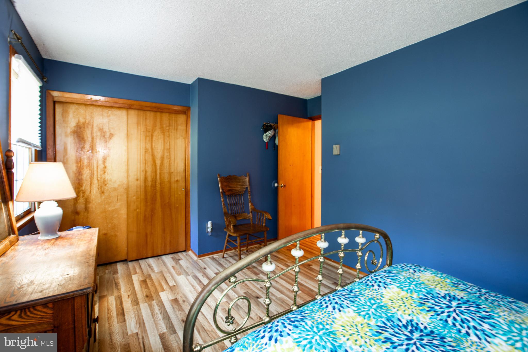 12 Millstream Road Cream Ridge, NJ 08514 - Photo 55 of 76 a bedroom with a bed and a dresser