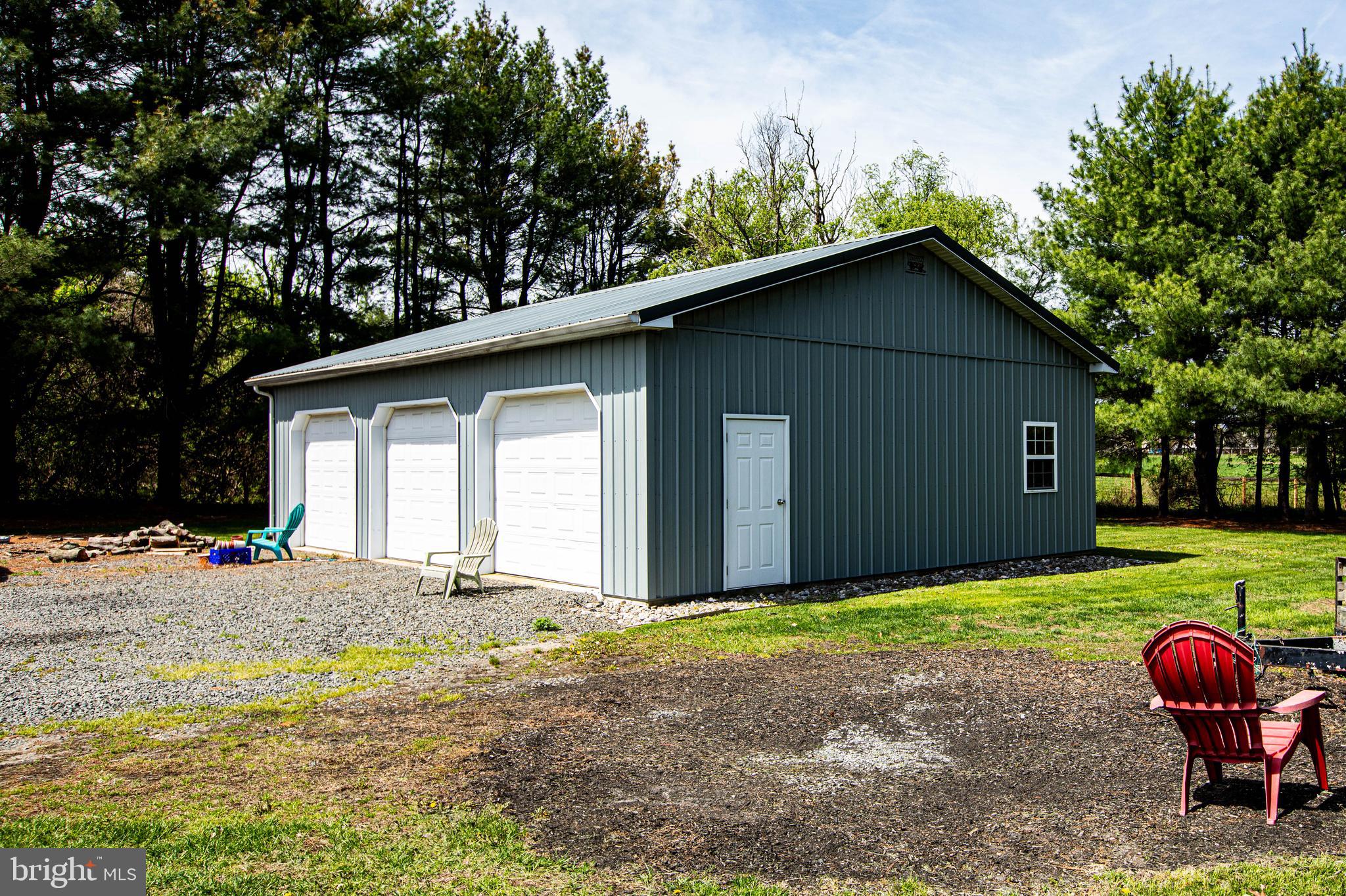 12 Millstream Road Cream Ridge, NJ 08514 - Photo 74 of 76 a front view of a house with garden