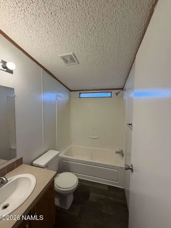 a view of a room with closet and wooden floor