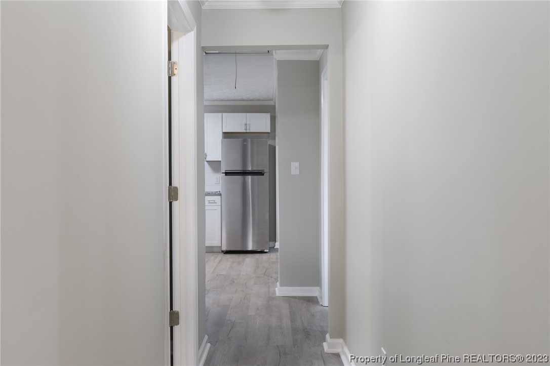 5348 Goldsboro Road Wade, NC 28395 - Photo 13 of 25 a view of a room with wooden floor