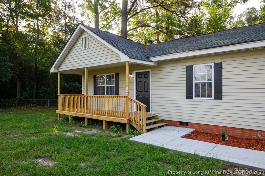 5348 Goldsboro Road Wade, NC 28395 - Photo 3 of 25 a view of backyard with deck and outdoor seating
