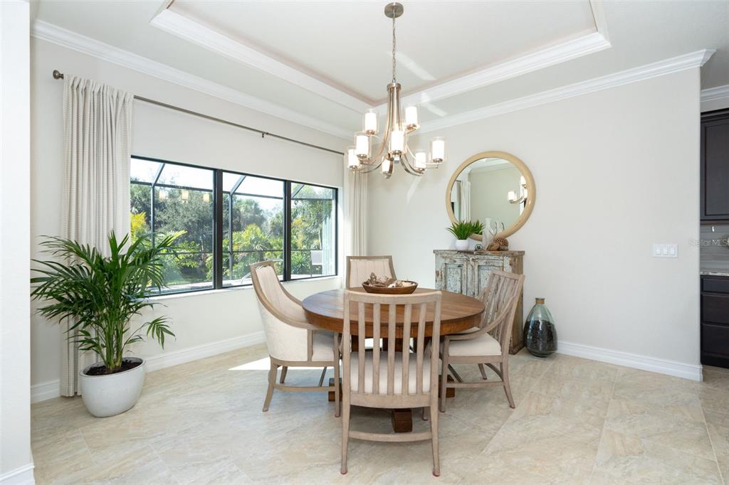 85 Spaniards Road Placida, FL 33946 - Photo 12 of 53 a view of a dining room with furniture window and outside view