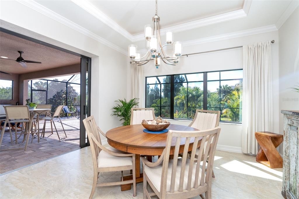85 Spaniards Road Placida, FL 33946 - Photo 18 of 53 a view of a dining room with furniture window and outside view