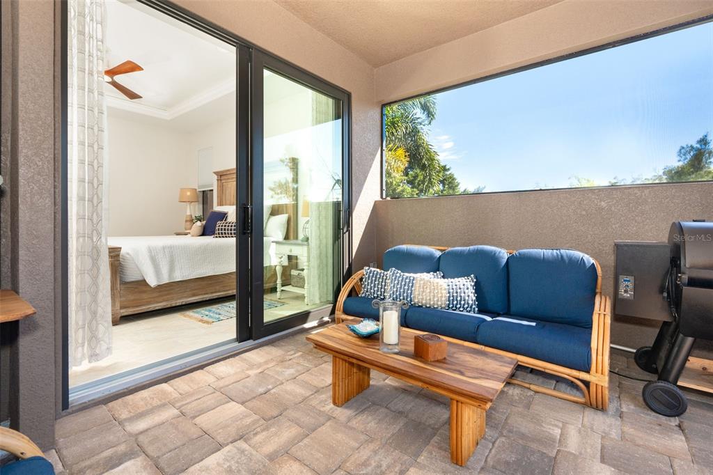 85 Spaniards Road Placida, FL 33946 - Photo 28 of 53 a living room with a couch and a large window