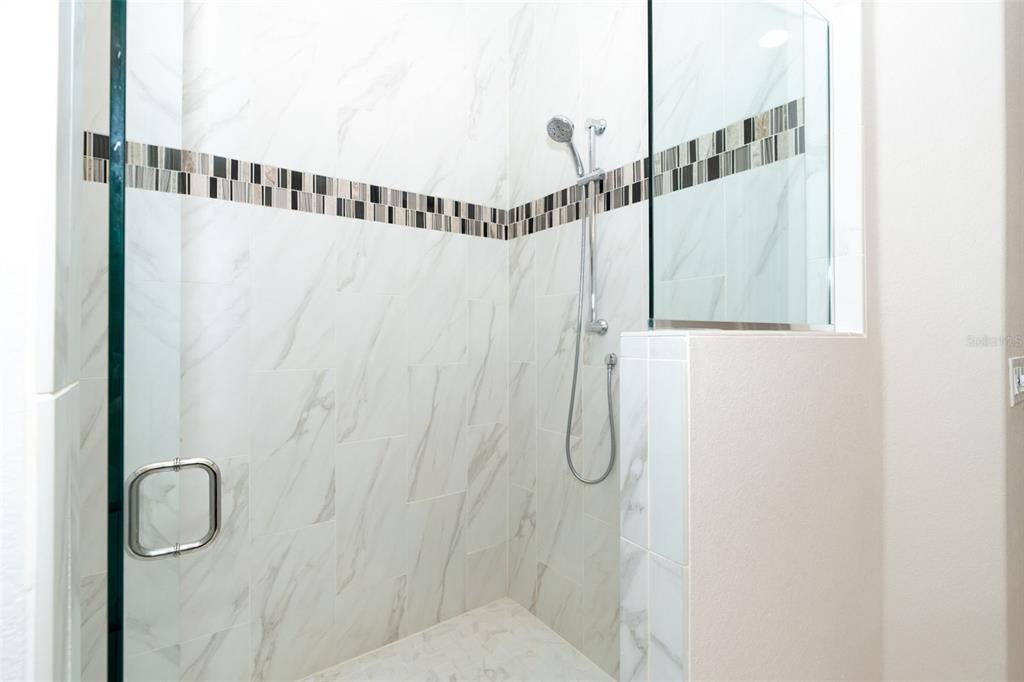 85 Spaniards Road Placida, FL 33946 - Photo 32 of 53 a bathroom with a shower and a shower head
