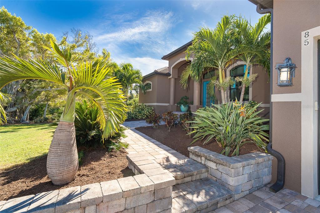 85 Spaniards Road Placida, FL 33946 - Photo 42 of 53 a plant in front of a house