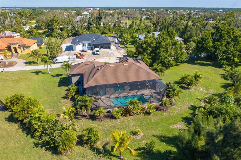 85 Spaniards Road Placida, FL 33946 - Photo 46 of 53 an aerial view of a house with a garden